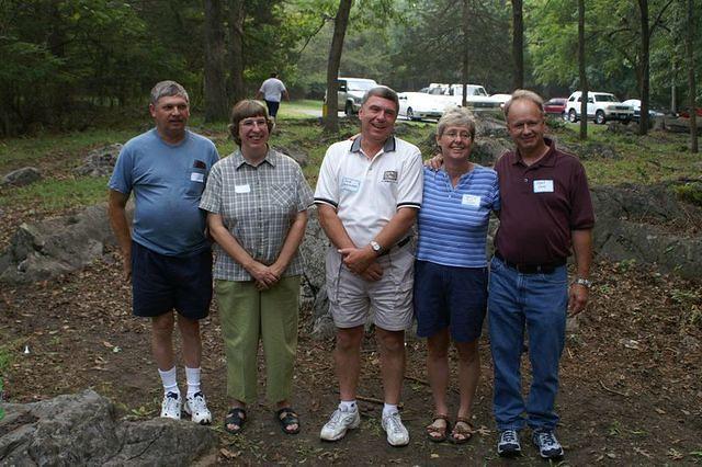 Old friends pose for a photo